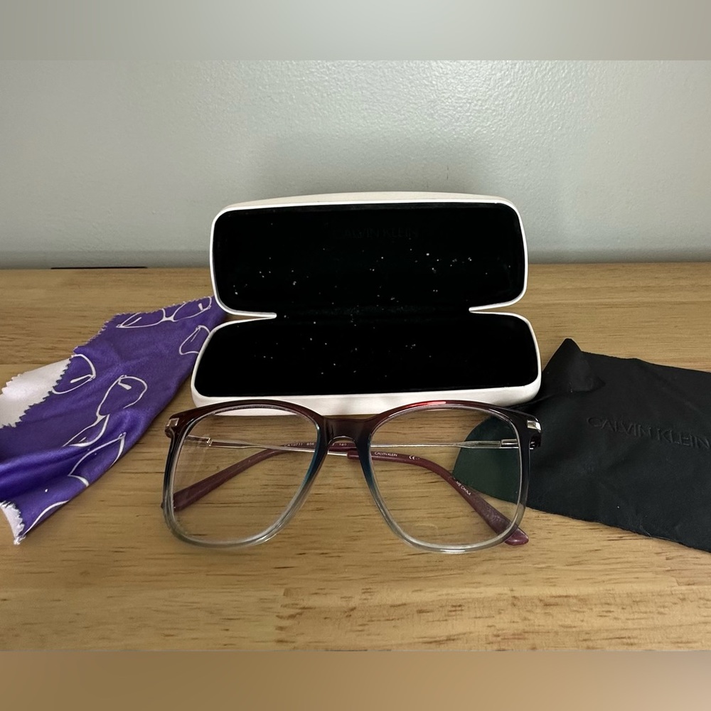 Calvin Klein women’s eyeglasses with matching hard case and 2 cleaning‎ cloths